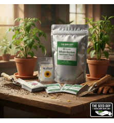 The Seed Guy 60 Variety Heirloom Seed collection in a silver Mylar bag with official brand logo.